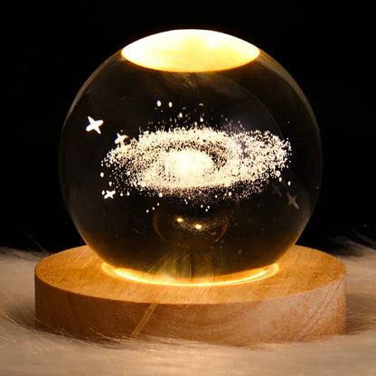 Crystal galaxy lamp with an astronaut